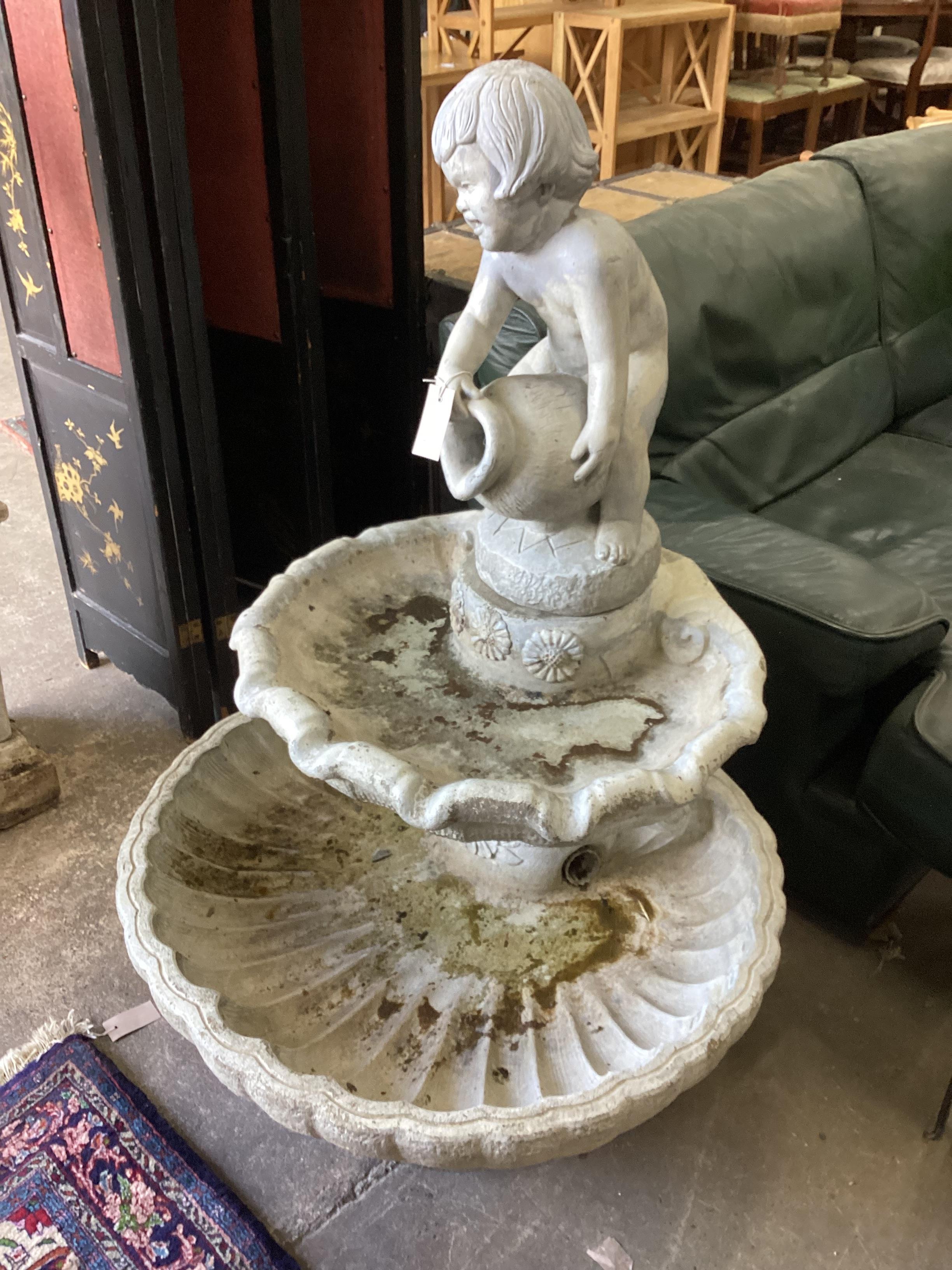 A French Henri Studios cherub and double scallop shell two tier garden fountain, width 80cm, height 120cm